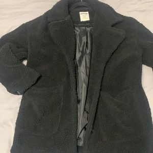Fluffy jacket with pockets and buttons